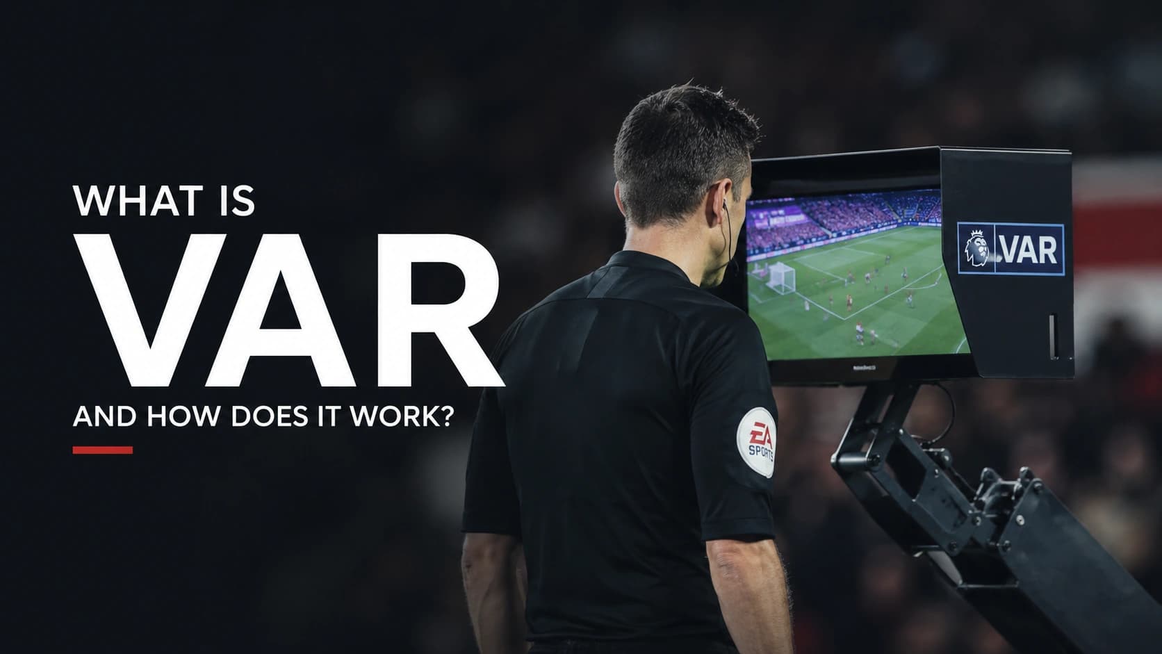 A referee checking a VAR replay on the pitch-side monitor